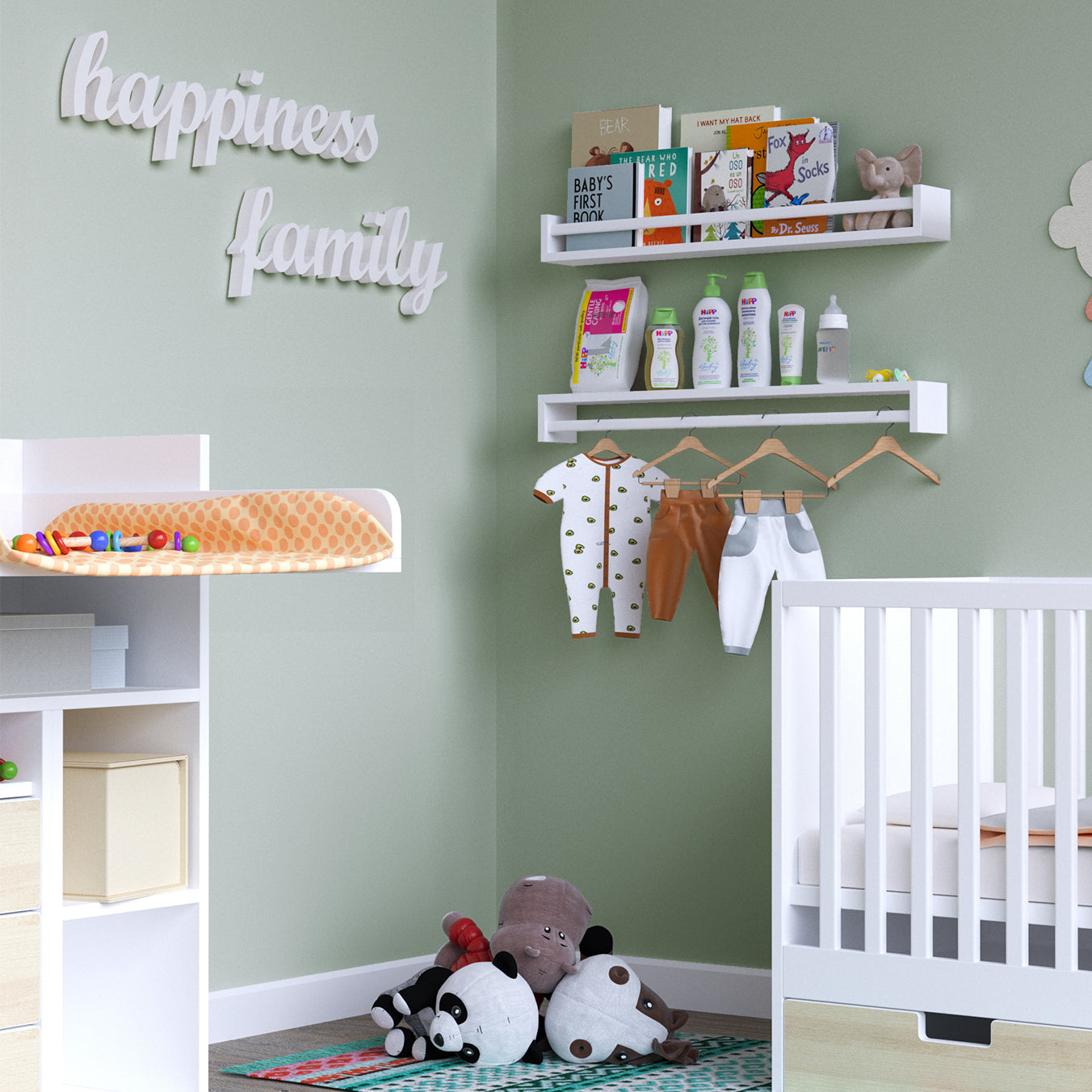 A nursery with two floating white shelves for kids, one holding books and baby products, the other with hanging baby clothes, next to a crib and play area with stuffed animals.