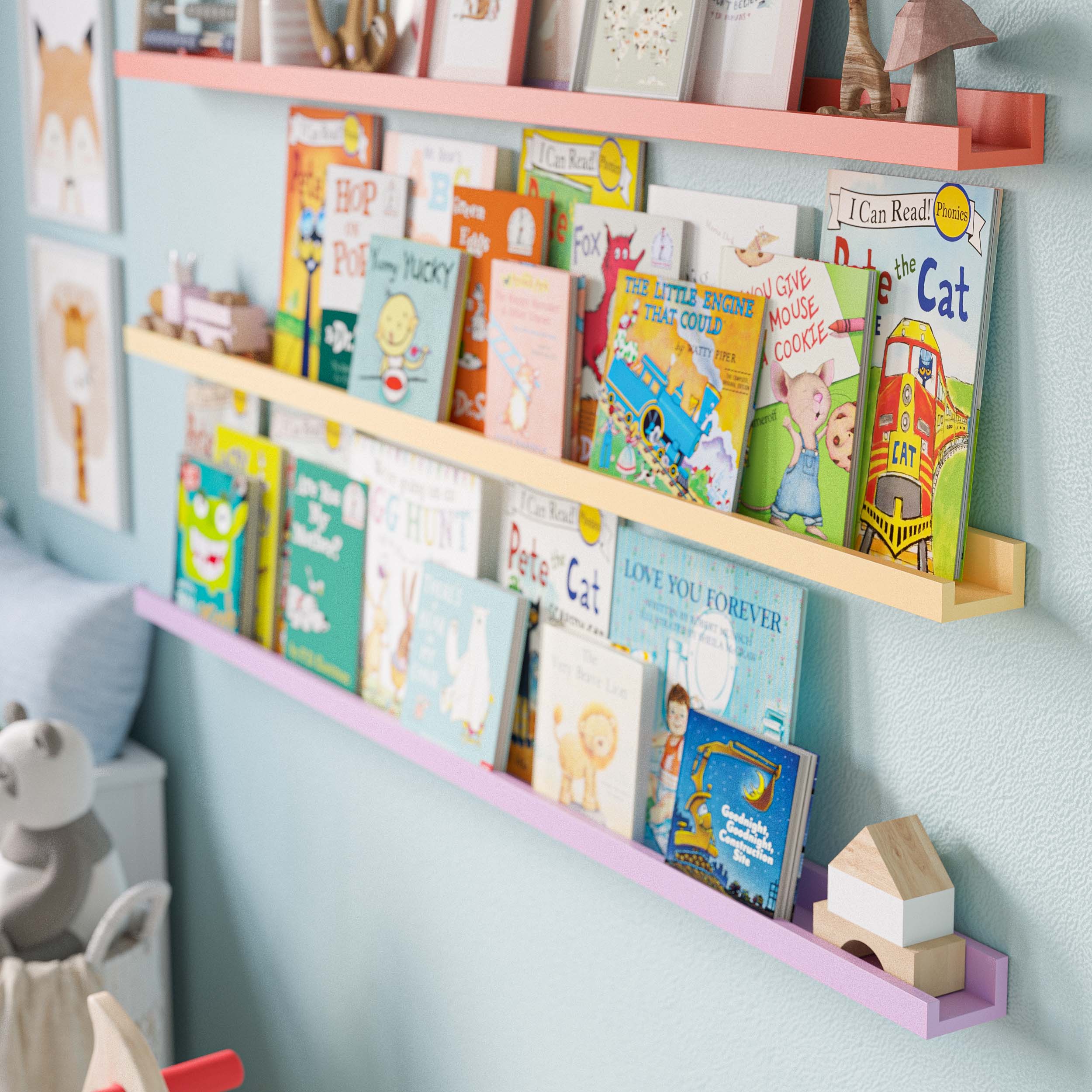 a closer view of the pastel-colored nursery wall shelves, highlighting the neatly arranged books and decorative items. The setup emphasizes an organized and colorful space, ideal for a child's room.