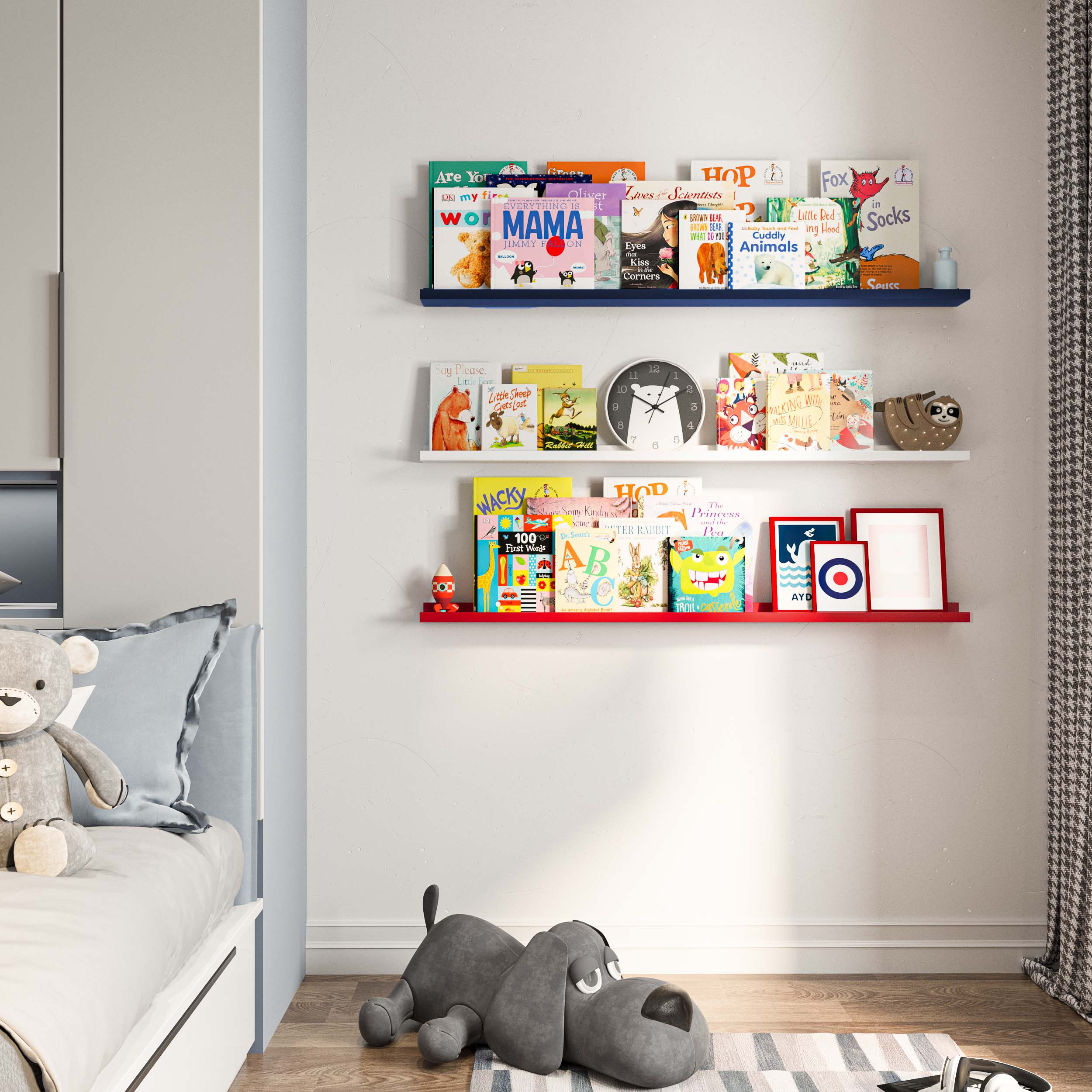 three wall-mounted shelves in a child's room, with the nursery shelves in different colors (blue, white, red). The long cute shelves are filled with children's books, and a plush toy dog is on the floor, creating a cozy reading nook.