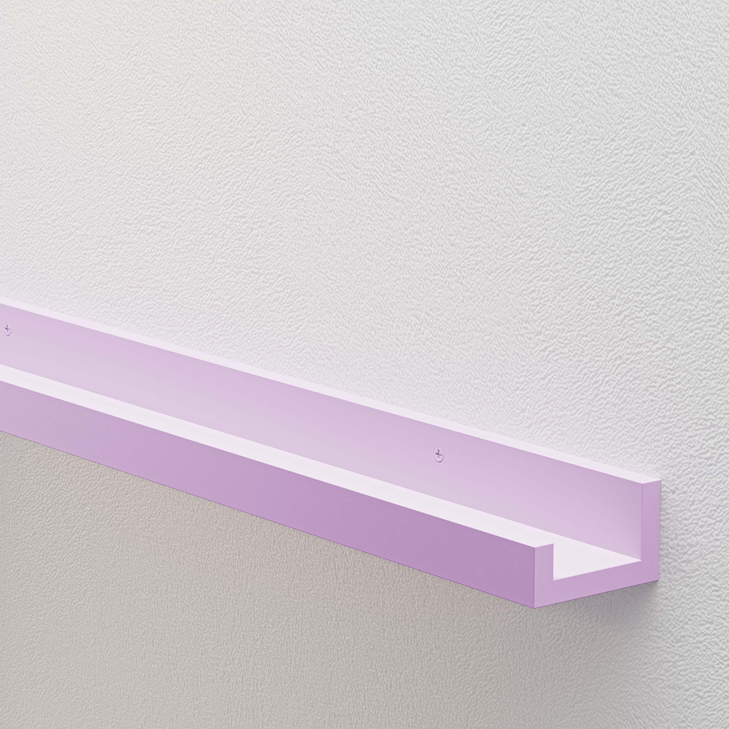  a floating shelf in a soft purple color, mounted on a wall. The light, pastel shade of purple gives the shelf a gentle and calming appearance, making it an ideal choice for adding a subtle touch of color to spaces like a nursery or a child’s bedroom.