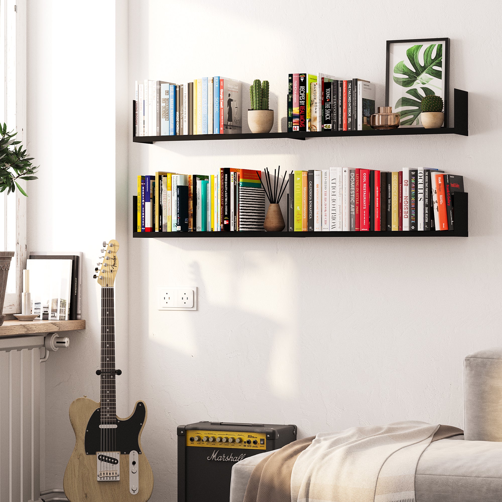 Music-themed room featuring two black metal shelves holding books and decor, adding style to the space with instruments and art, ideal for a creative setup.