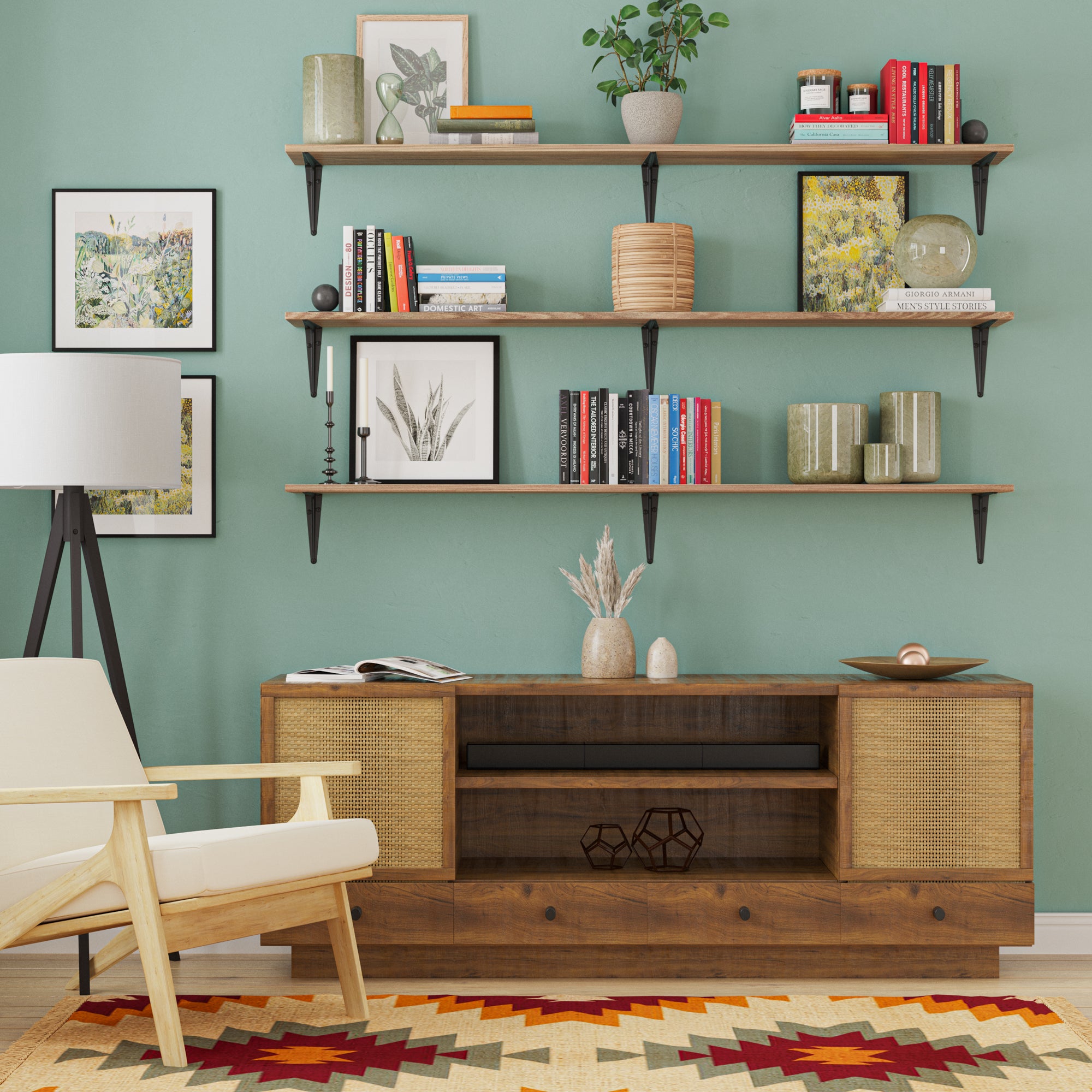 Vibrant living area with shelving unit wall mounted burnt over a wooden console, decorated with books, art, and various decor against a green wall.
