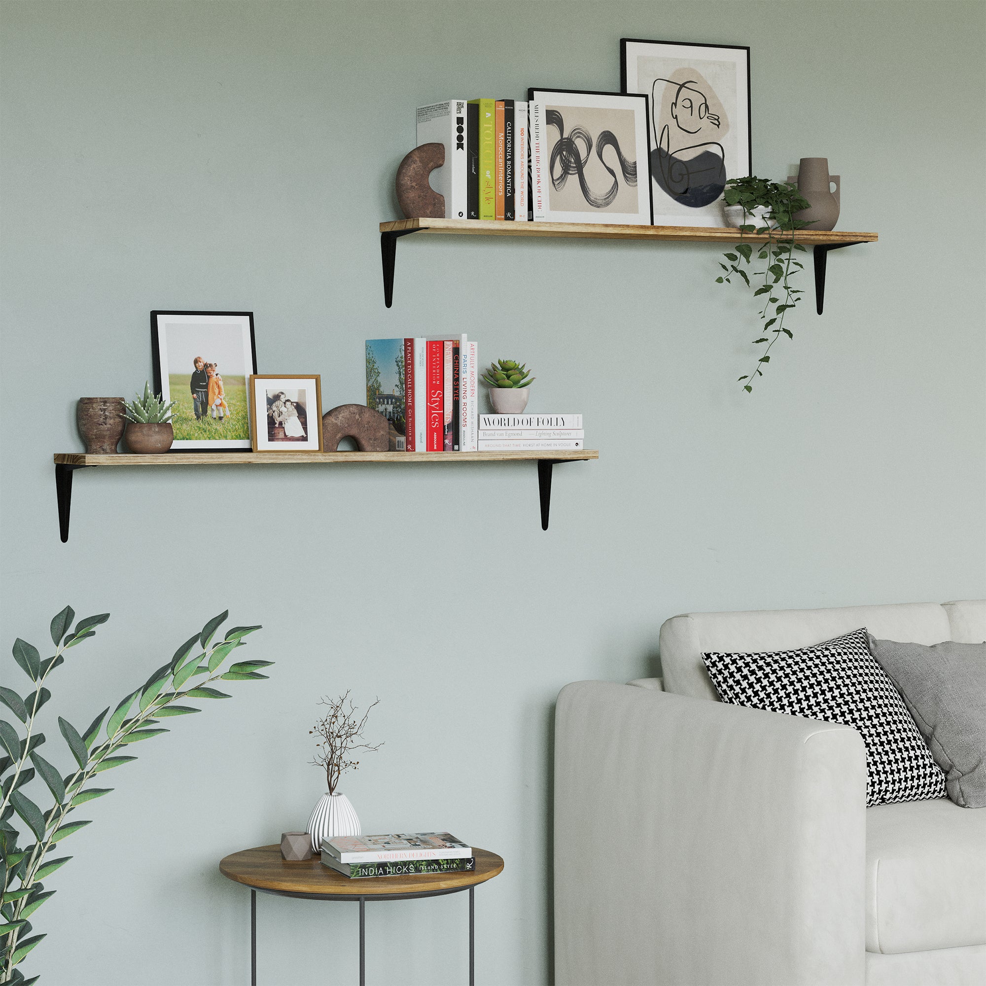 Living room decor with floating bookshelves for wall displaying books, decorative items, and framed artwork.