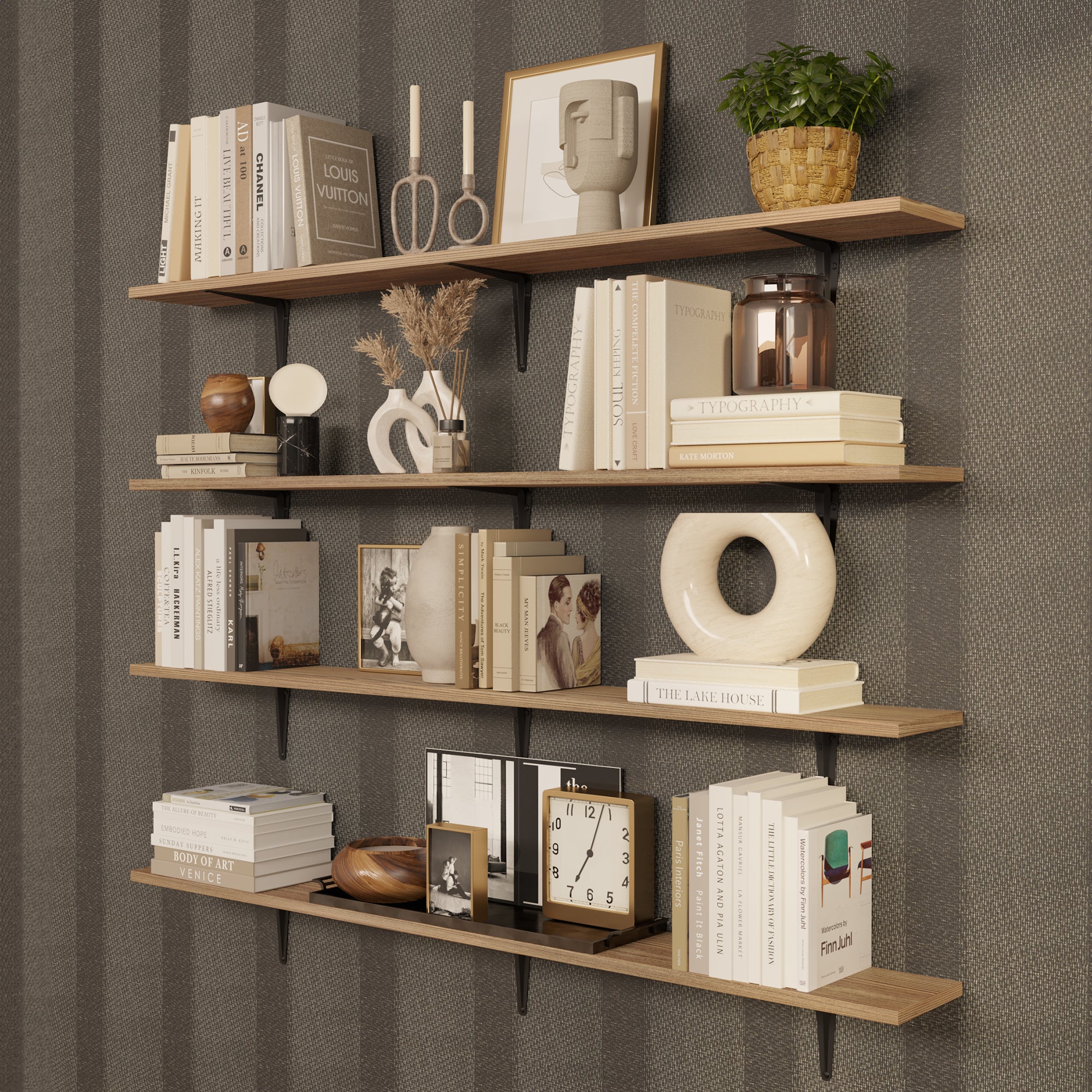 Four floating book shelves with neutral books, vases, and textured décor. Warm lighting and earthy tones make it a standout design feature.