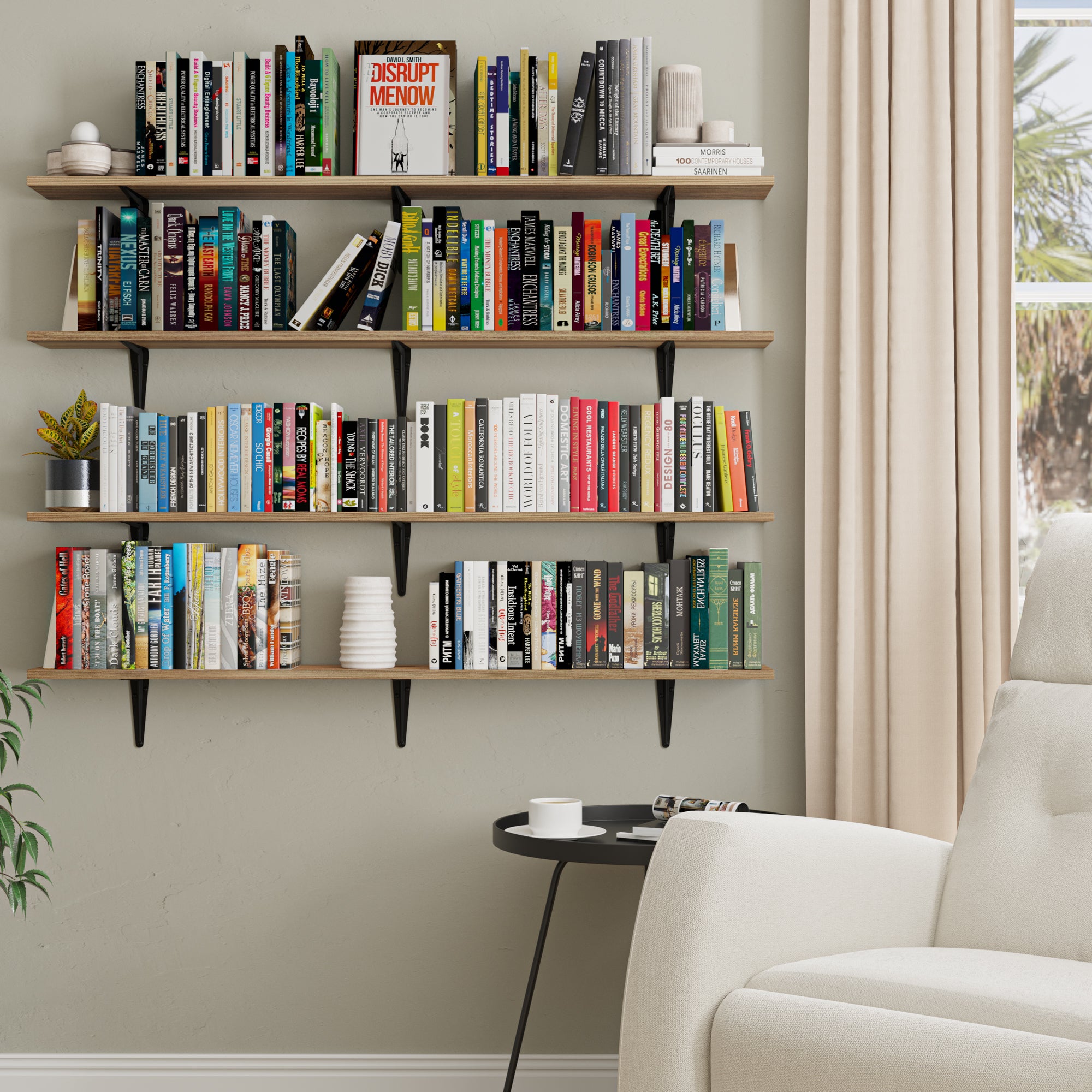 A cozy reading nook featuring four burnt shelves for wall shelves, heavily stacked with a diverse collection of books, framed by a large window with curtains, and a comfy chair in the foreground.