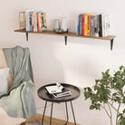 Simple hanging shelf for living room holding books and decorative pieces over a black round side table and a cozy armchair, ideal for compact reading corners.