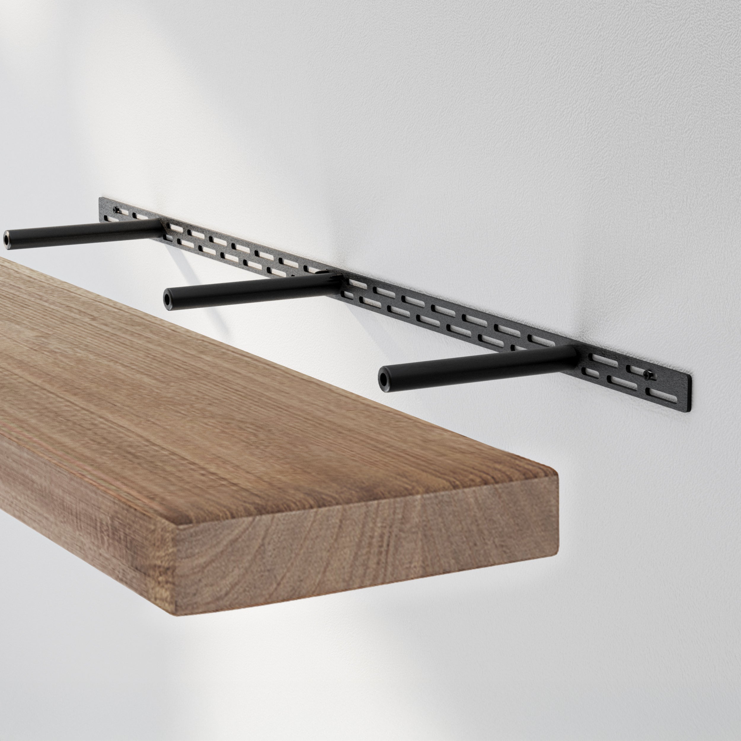 A floating shelf with a black hidden bracket system with metal rods extending from a slotted steel mount, supporting a 2'' thick rustic shelf with a special walnut finish for a clean, floating wall shelf look.