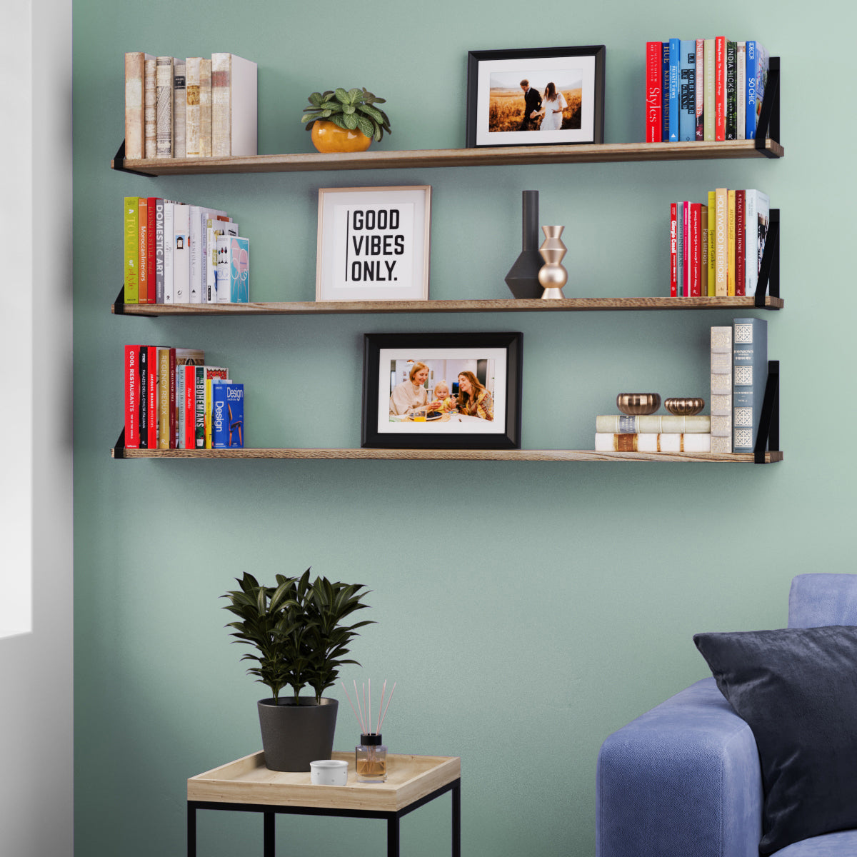 Cozy living room decor with multiple display shelves filled with books, framed pictures, and decorative items.