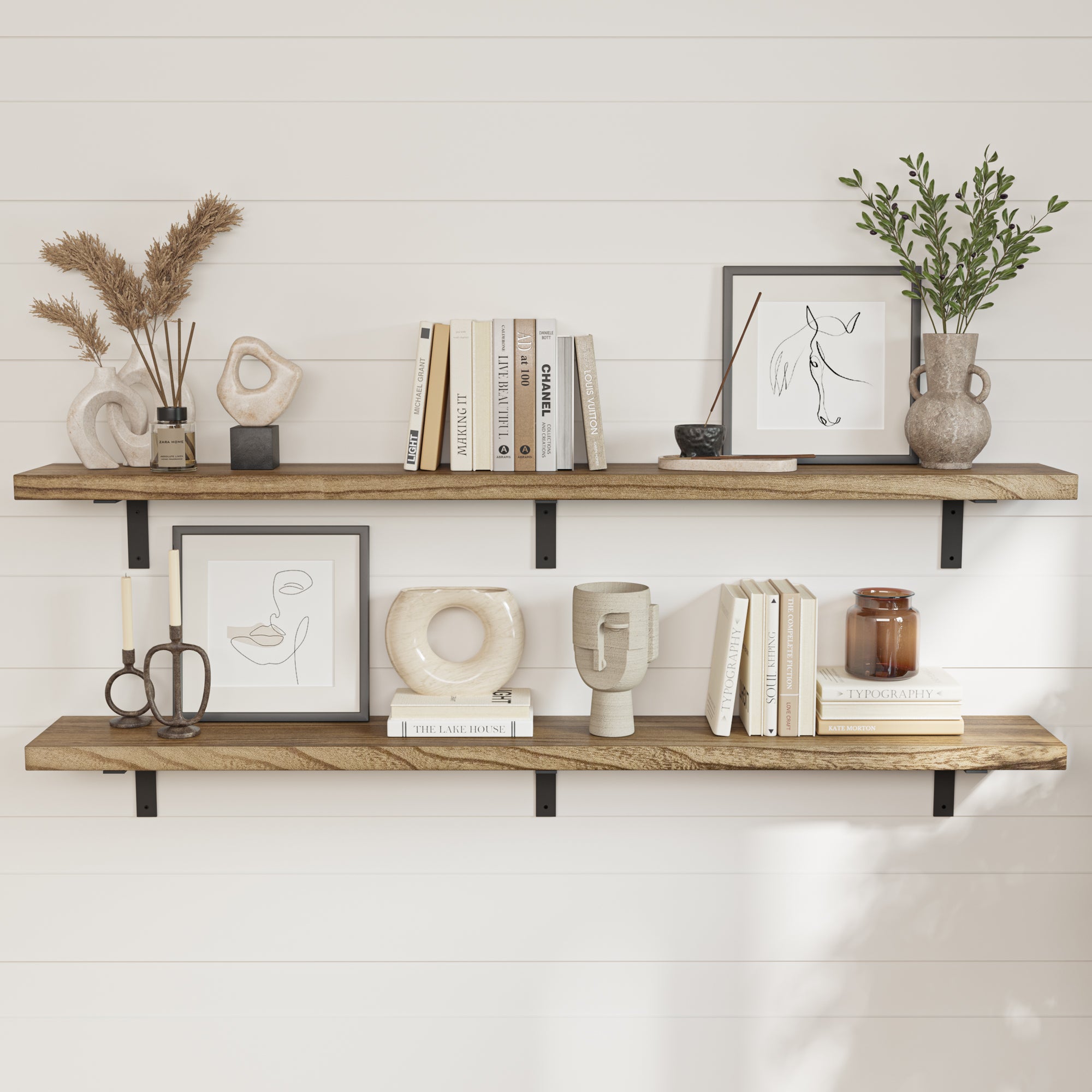 Rustic shelves setup with decorative objects, artwork, and books, against a white shiplap wall, creating a warm and inviting shelf decor & atmosphere.