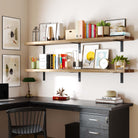 Two 72 inch extra long wall bookshelves in a workspace above a black desk, beautifully organized with books, plants, and office decor, highlighting versatile and functional storage.