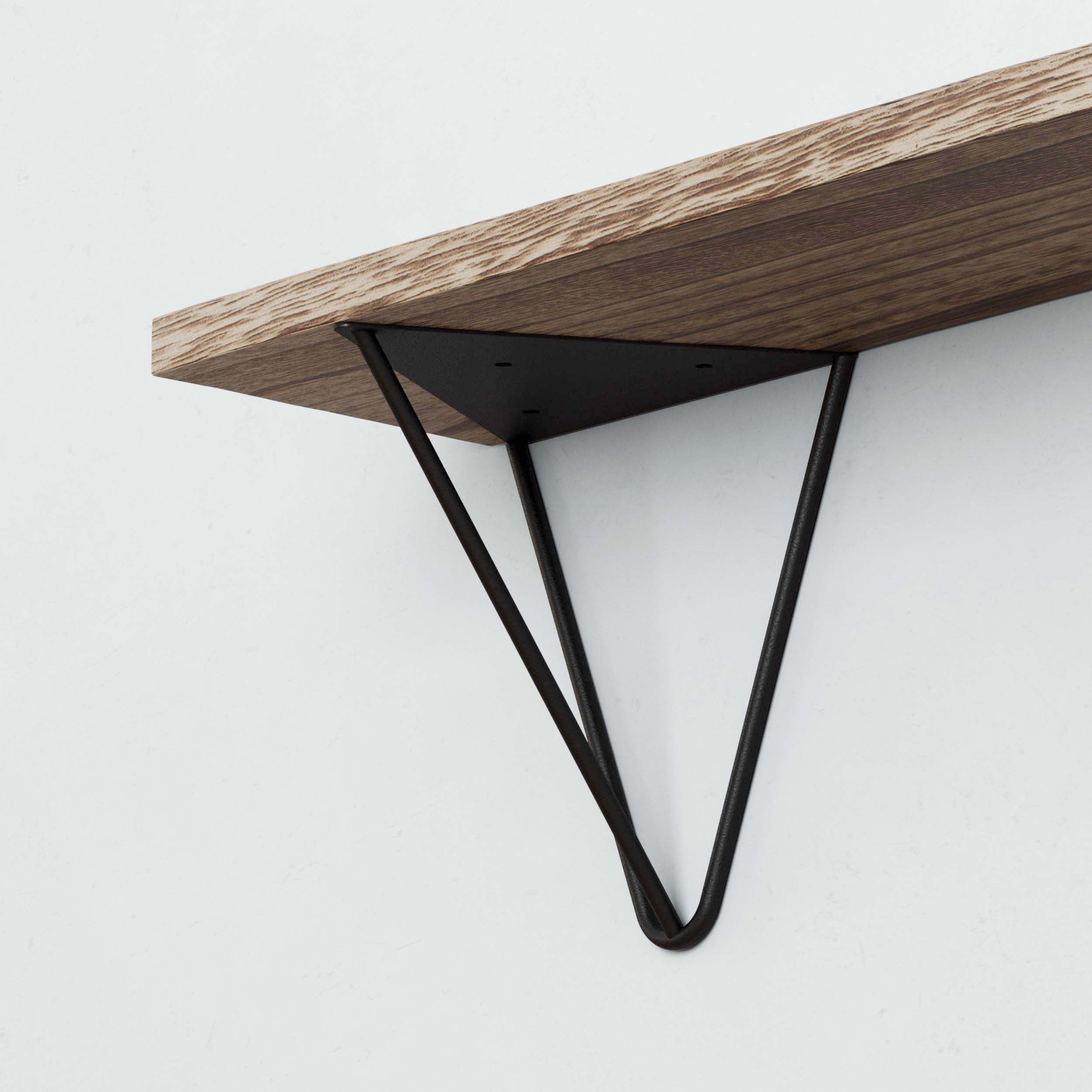 Black triangular shelf bracket supporting a wooden shelf.