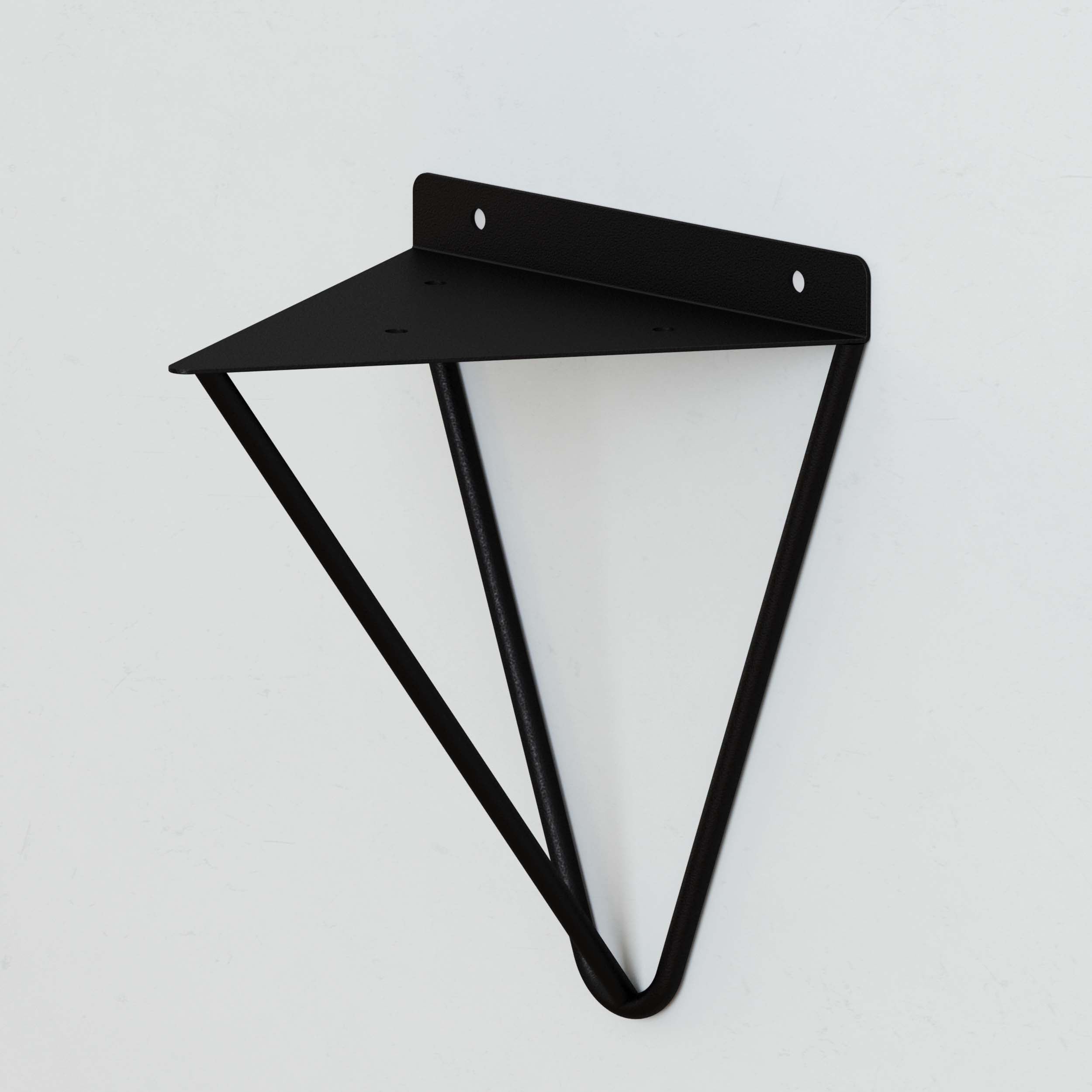 A single black triangular shelf bracket mounted on a wall.