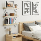 Bedroom with display shelves supported by black triangular floating shelves brackets.