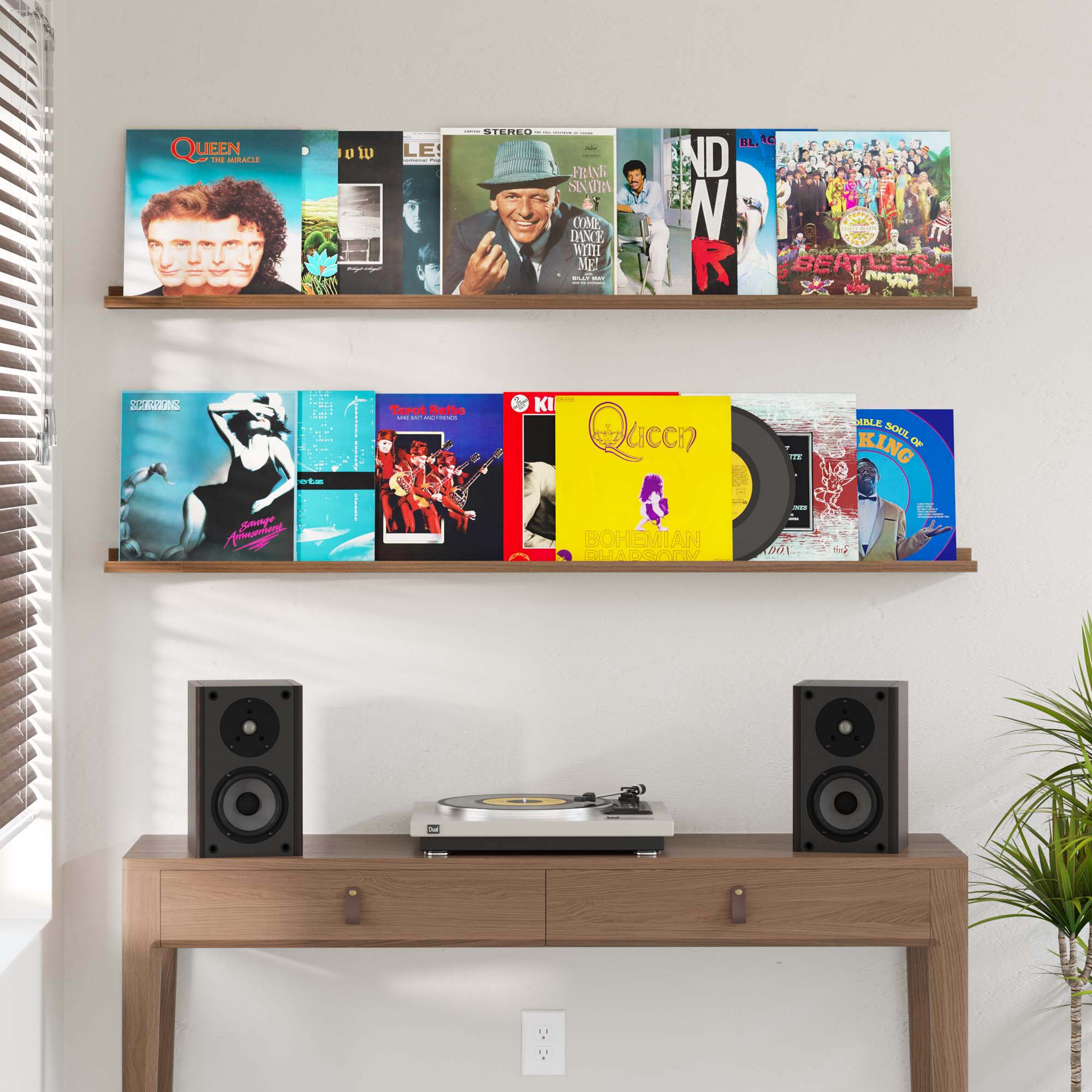 2 lego display shelves in a music-themed room holding a collection of classic vinyl album covers, complementing a turntable setup.