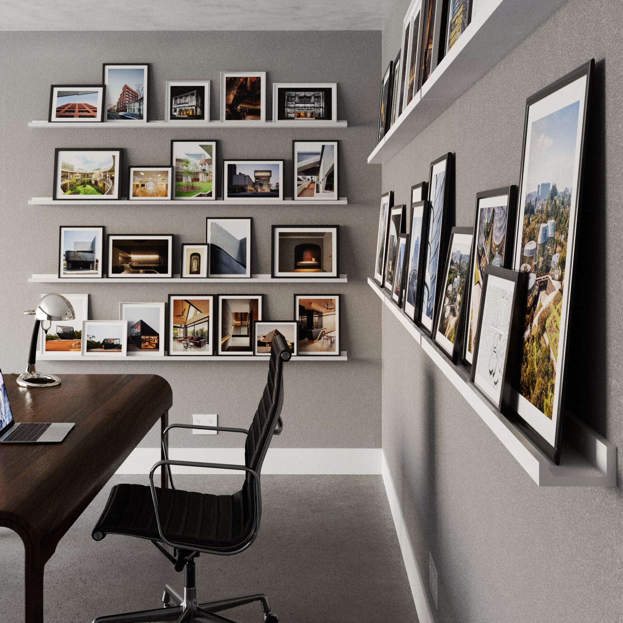 Multiple white storage shelves with various art frames in a stylish office.