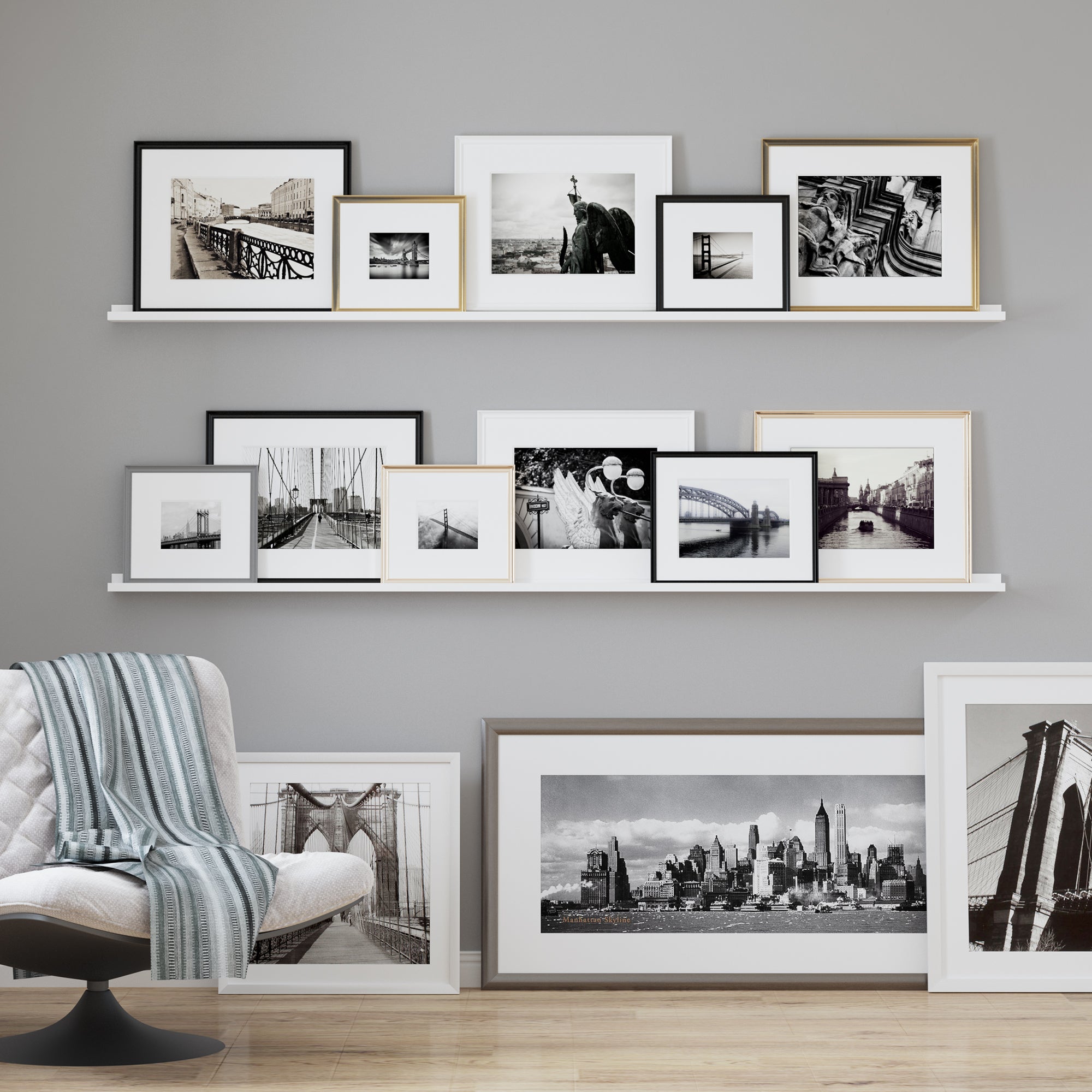 White floating shelves with various photo and stylish art frames in a cozy room.