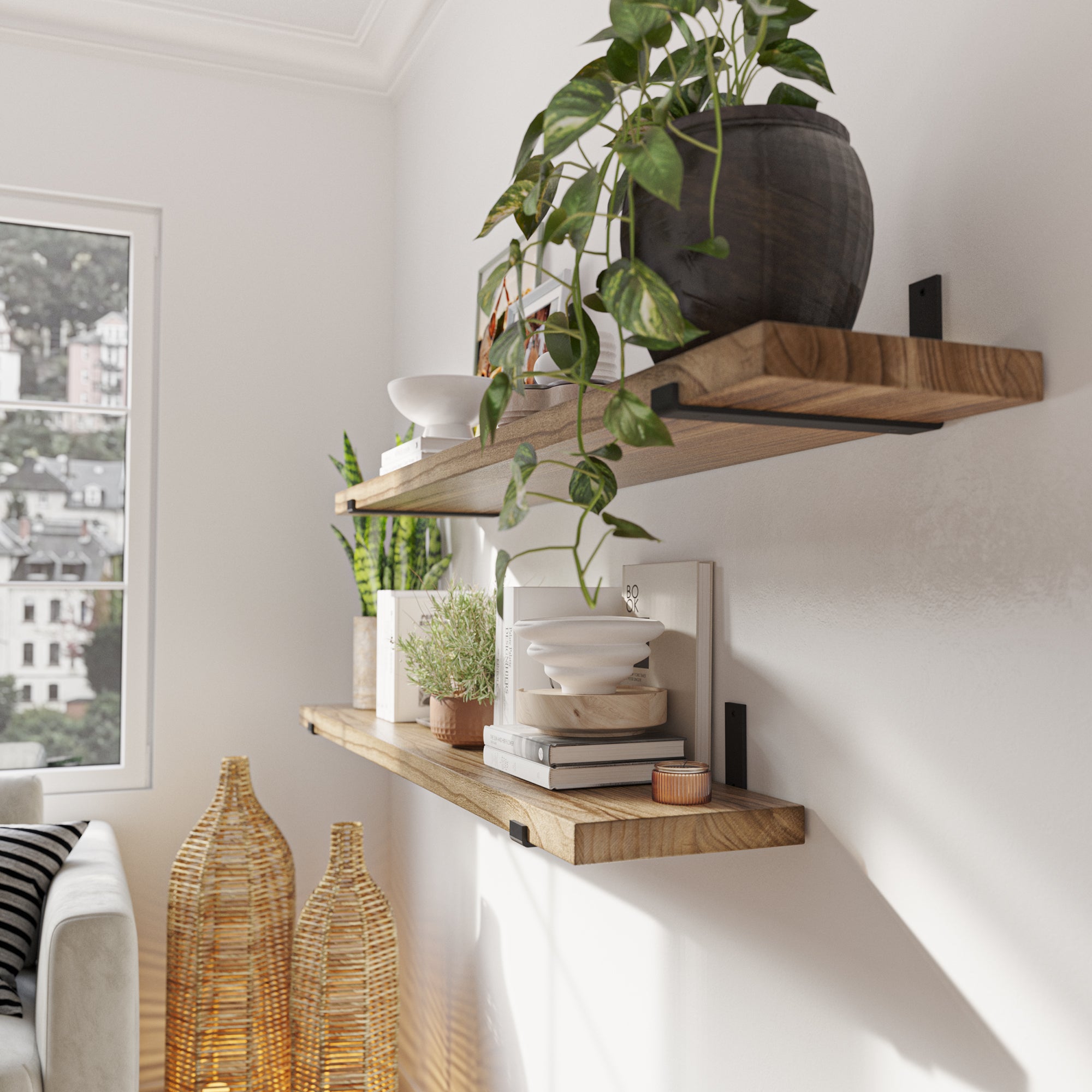 Wooden shelves with plants and décor in a bright room.