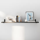 A variation of the floating shelf with a darker wood-ebony finish, showcasing similar decor items, highlighting its versatility in matching various color schemes and room designs.