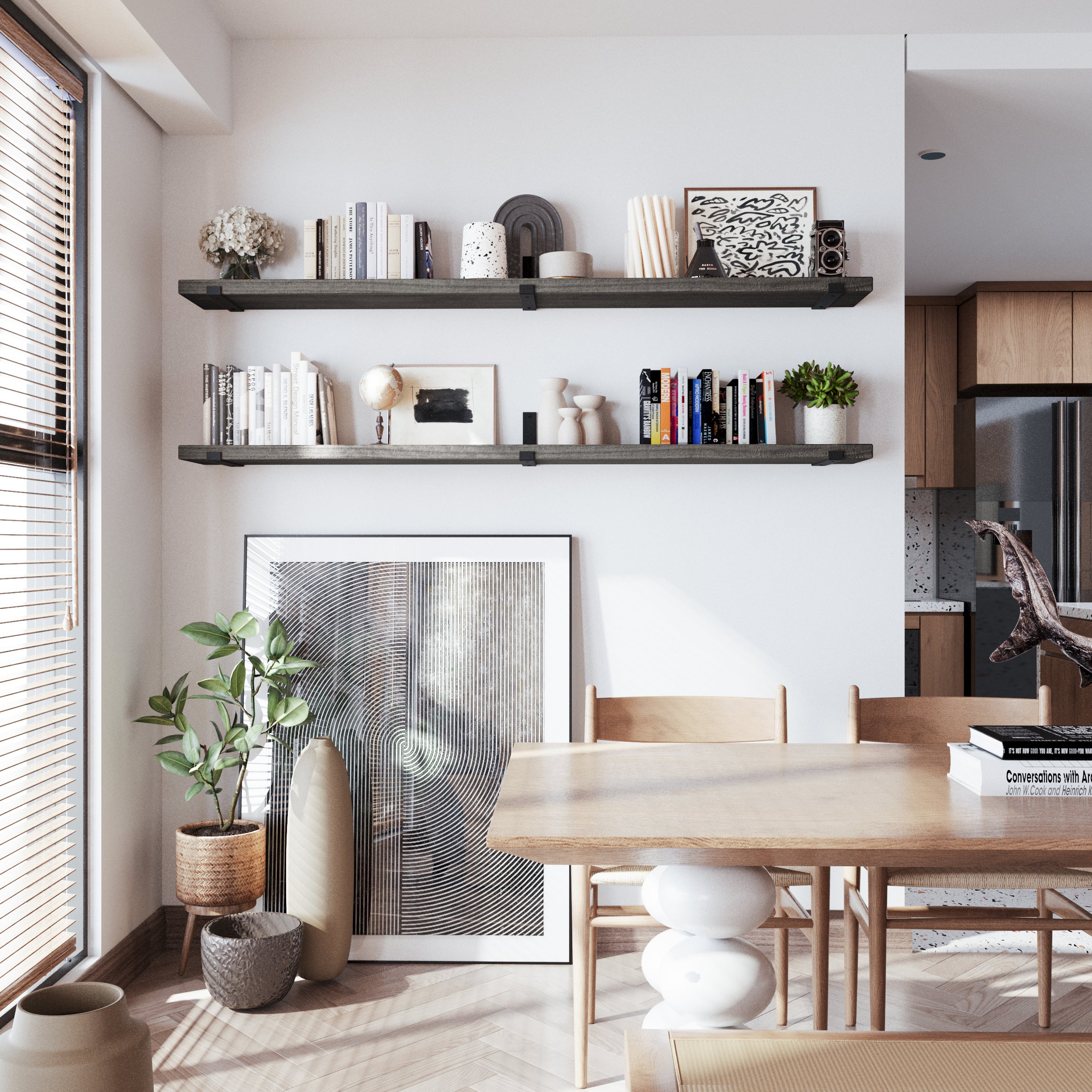 Minimalist ebony wall book shelves in a bright dining space, styled with monochrome books and decorative vases, adding structure and style above the table.