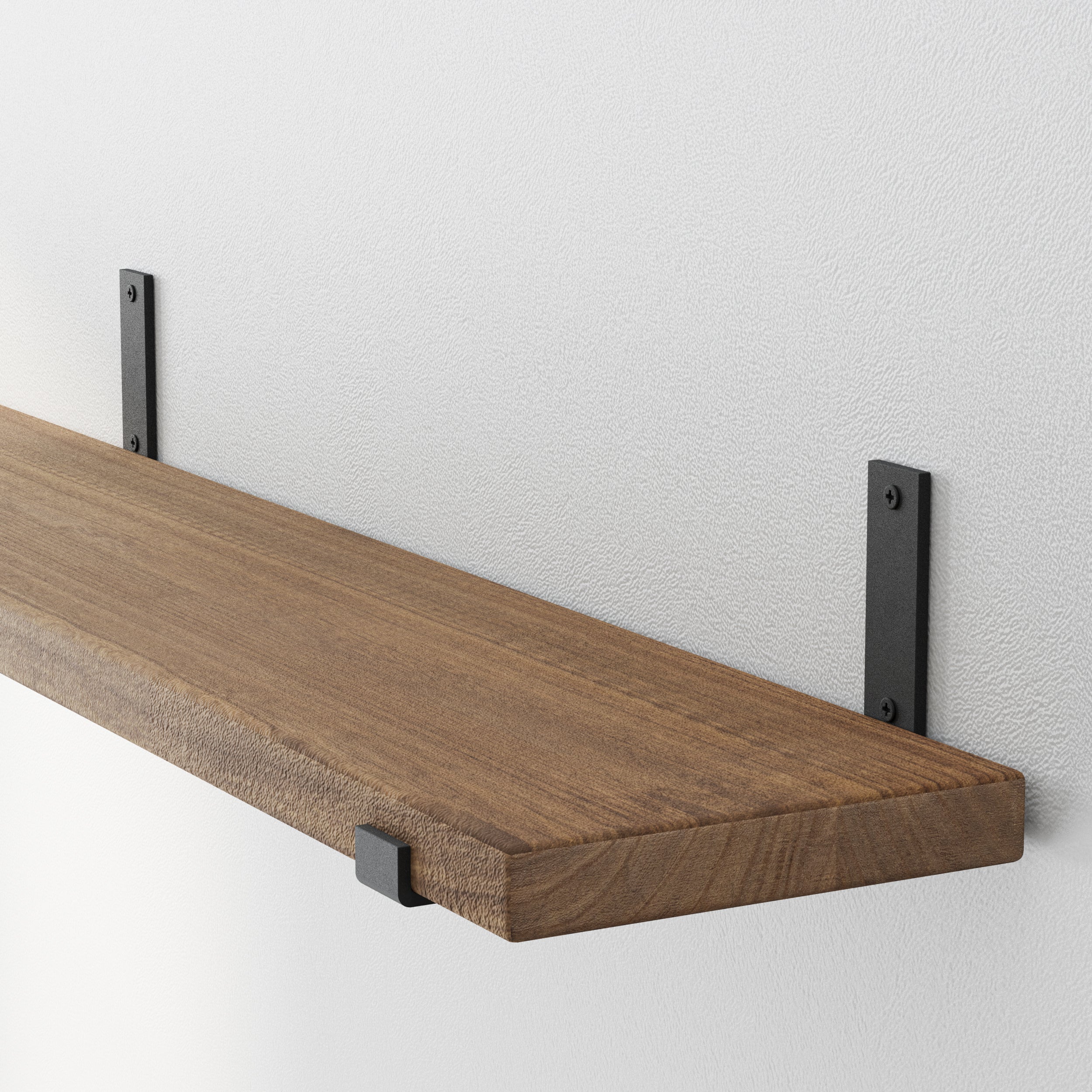  Provincial wood finish wall mounted shelf and its sturdy black brackets. The fine grain and warm tone of the wood are complemented by the matte black metal, adding rustic-meets-modern appeal.