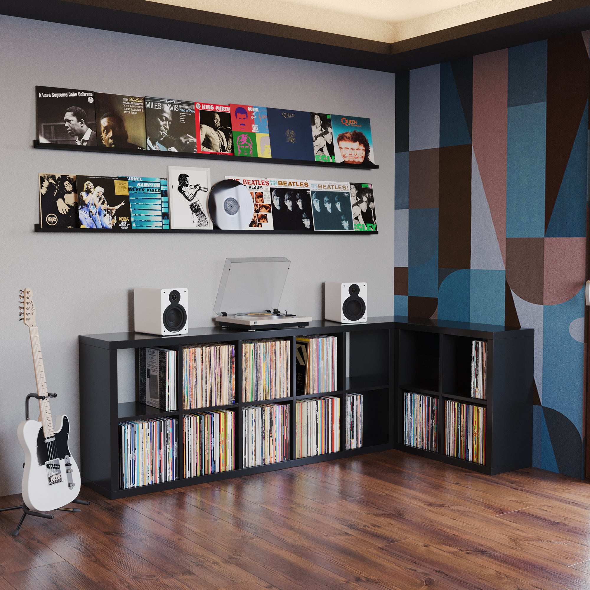 Vinyl records and player on black floating shelves for wall in a music-themed room.