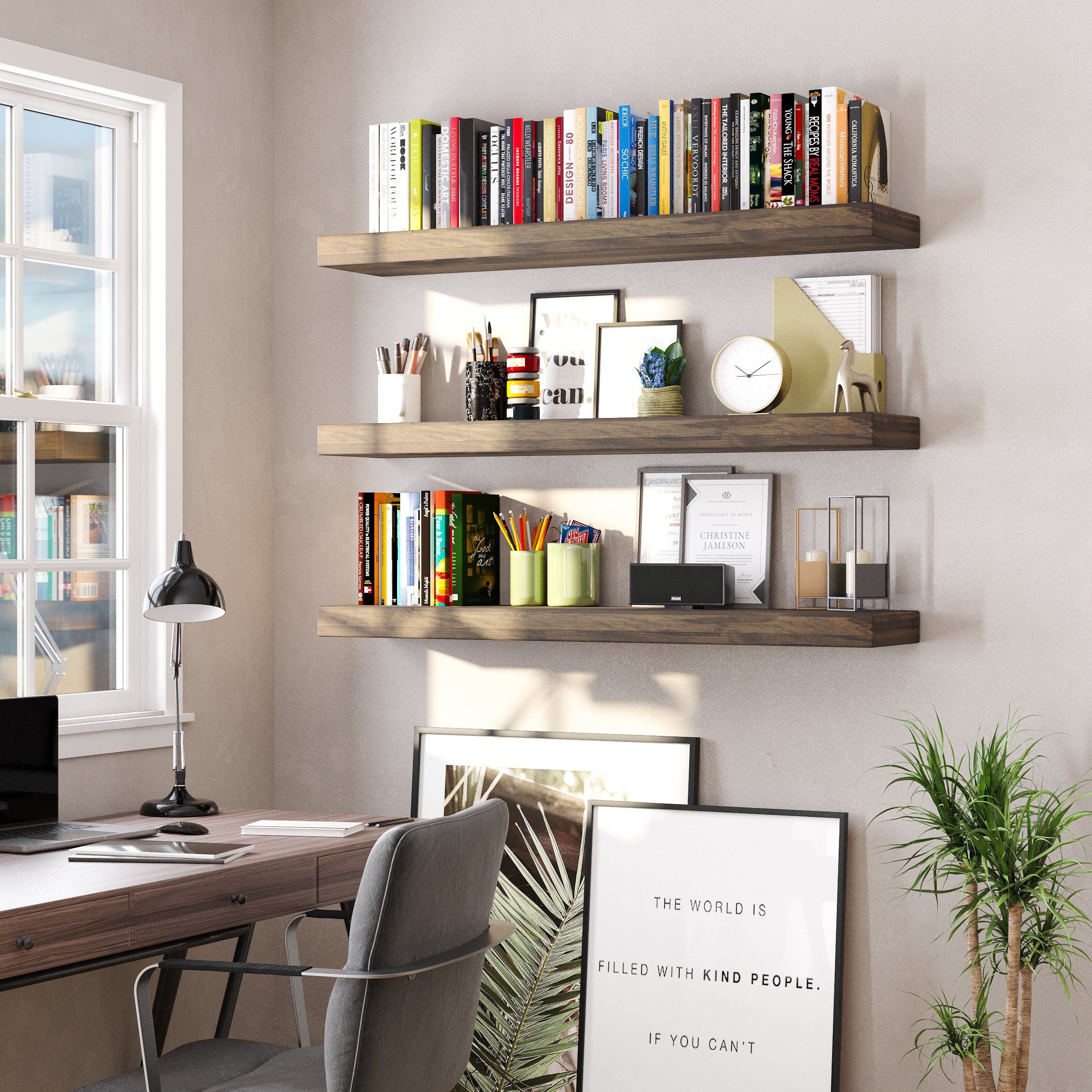 A home office wall features three espresso-colored floating shelves organized with books, pencils, clocks, and décor—enhancing productivity with modern charm.