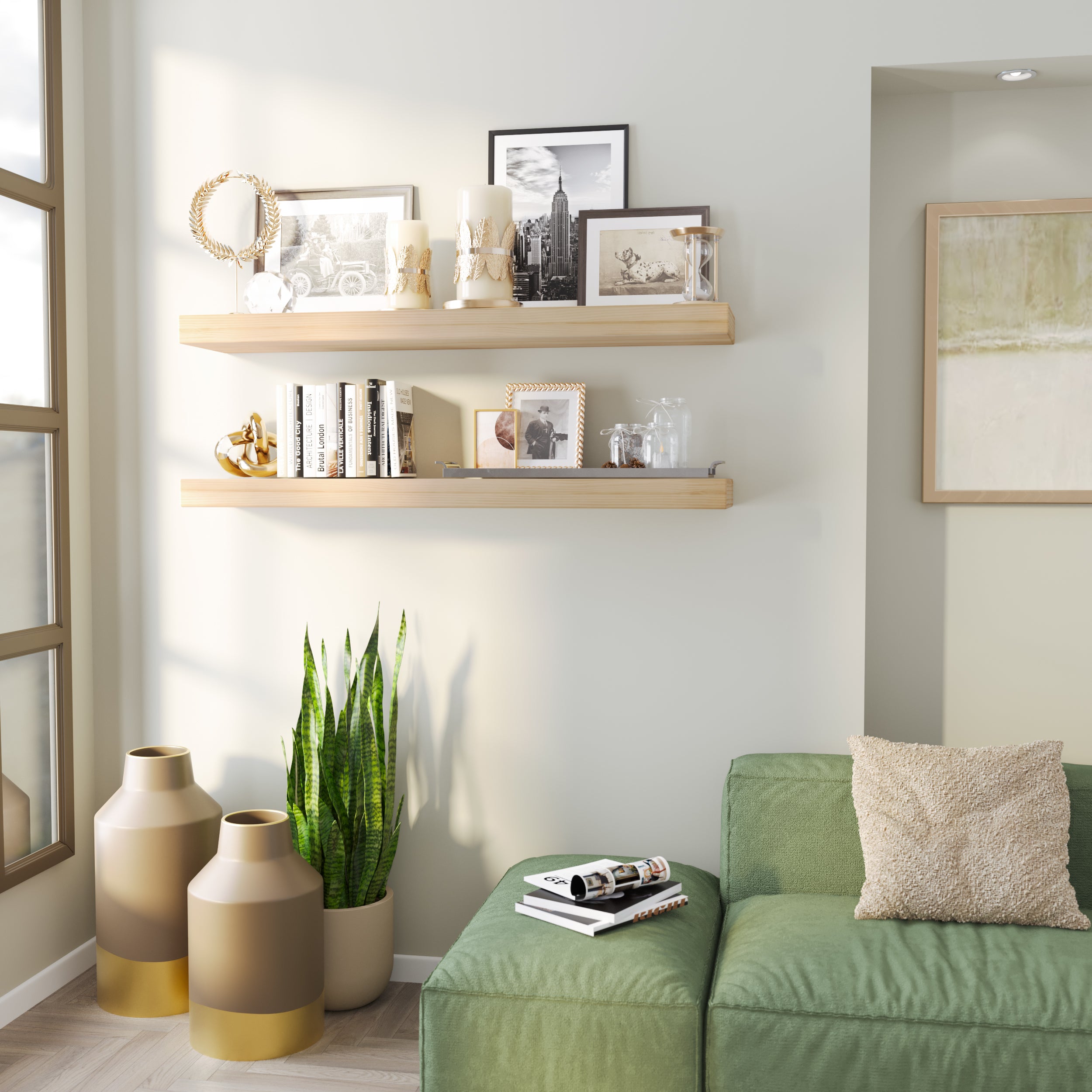Two floating shelves in a natural finish adorn a cozy corner with black-and-white photos, candles, and decor, complementing the soft lighting and green seating below.