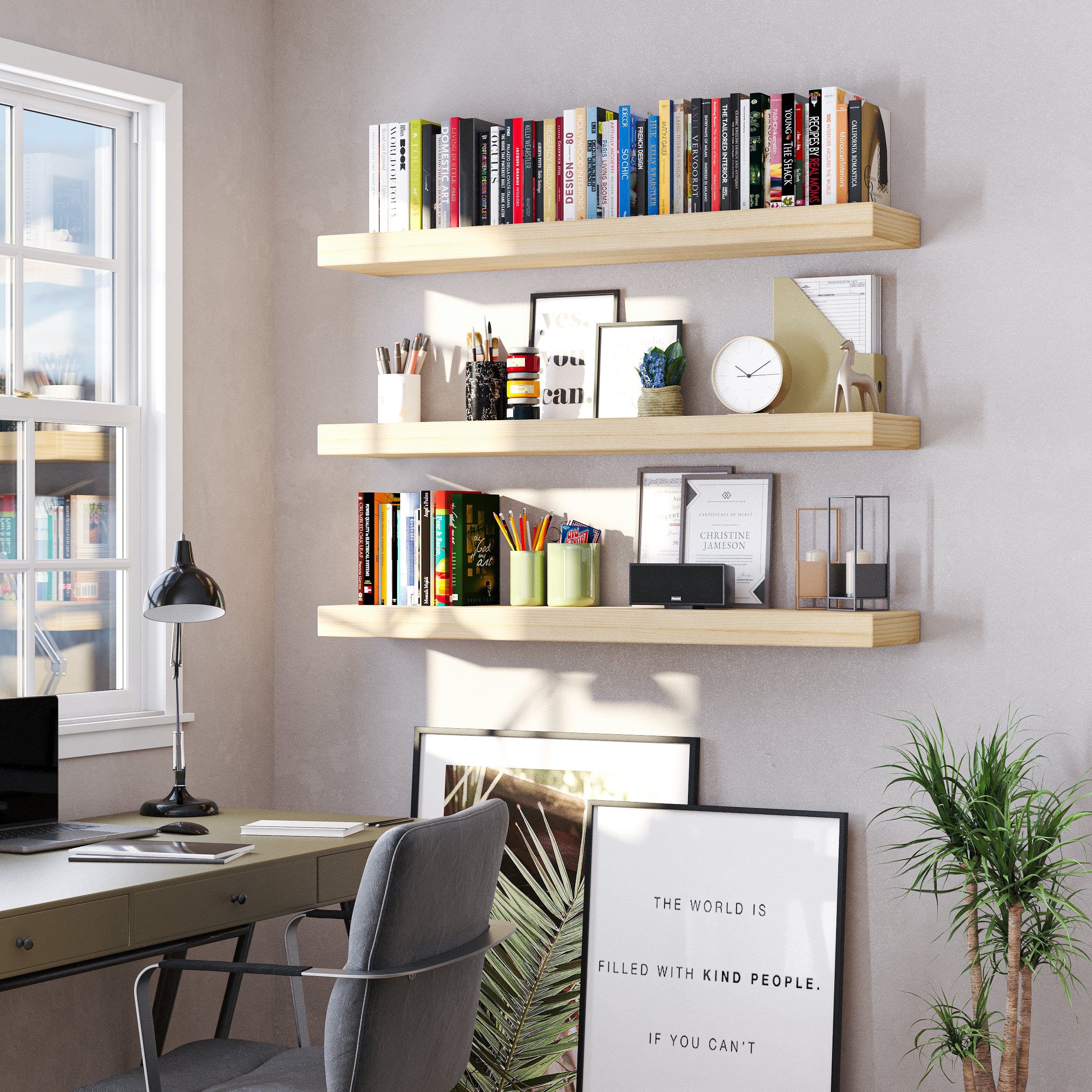 An elegant home office setup with three ultra thick boho shelves in natural finish, organizing stationery, books, framed art, and accessories above a modern desk by the window.