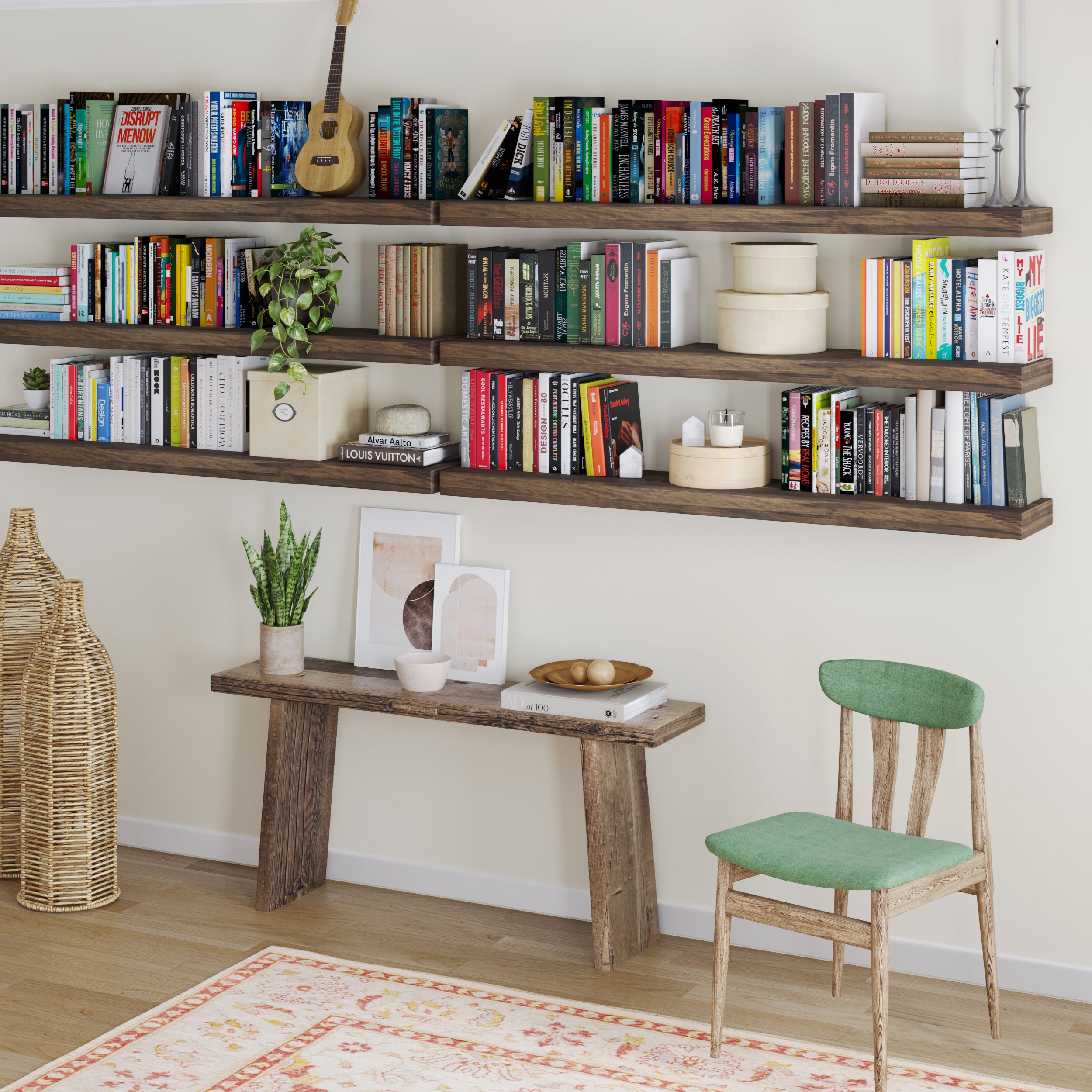 A creative bookshelf setup features multiple dark wood ledges filled with colorful books, plants, and decorative accents, transforming the wall into a stylish home library.