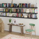 A functional and decorative wall-mounted setup featuring six floating ebony-finish farmhouse shelves filled with books, plants, and storage boxes. Perfect for a home library or study room.