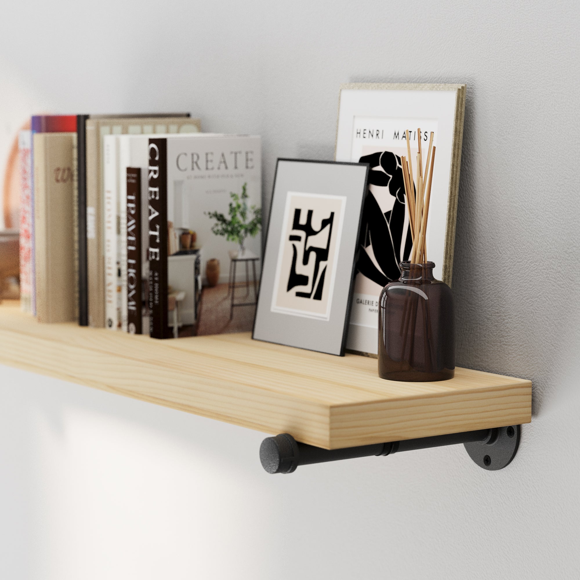A natural real wood floating shelf showcasing real wood grain, sturdy black pipe brackets, and decorative accents. Ideal as an entryway shelf, office bookshelf, display ledge, or rustic home décor shelf.