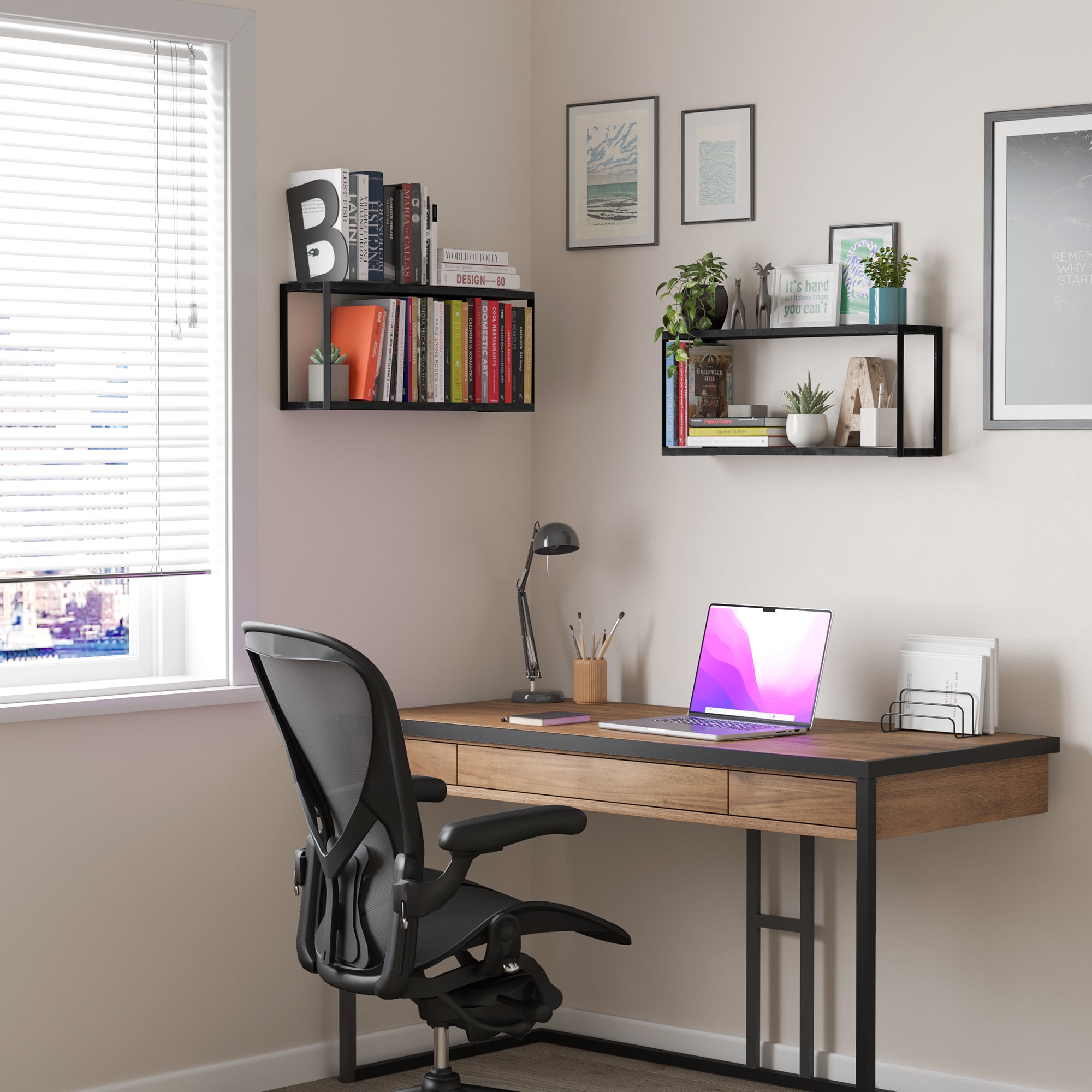 Home office with wooden shelves supported by black rectangular metal brackets, displaying books and decor.