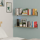 Wall mount bedroom shelves burnt in a bedroom, loaded with colorful books and decorative items, complementing the tranquil decor.