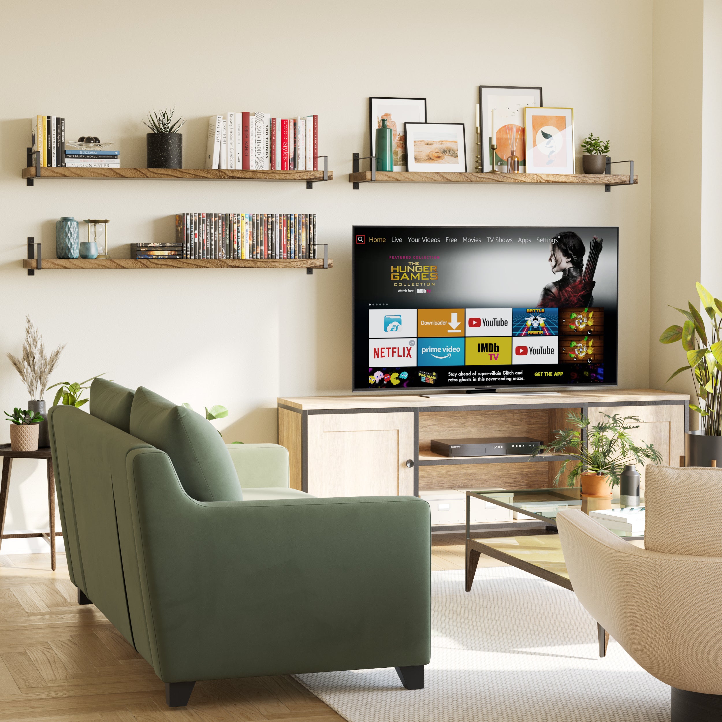 Three farmhouse shelves on either side of a TV setup create a symmetrical, organized media wall. Books, decor, and frames are neatly arranged above a wooden TV unit and in front of a soft green couch.