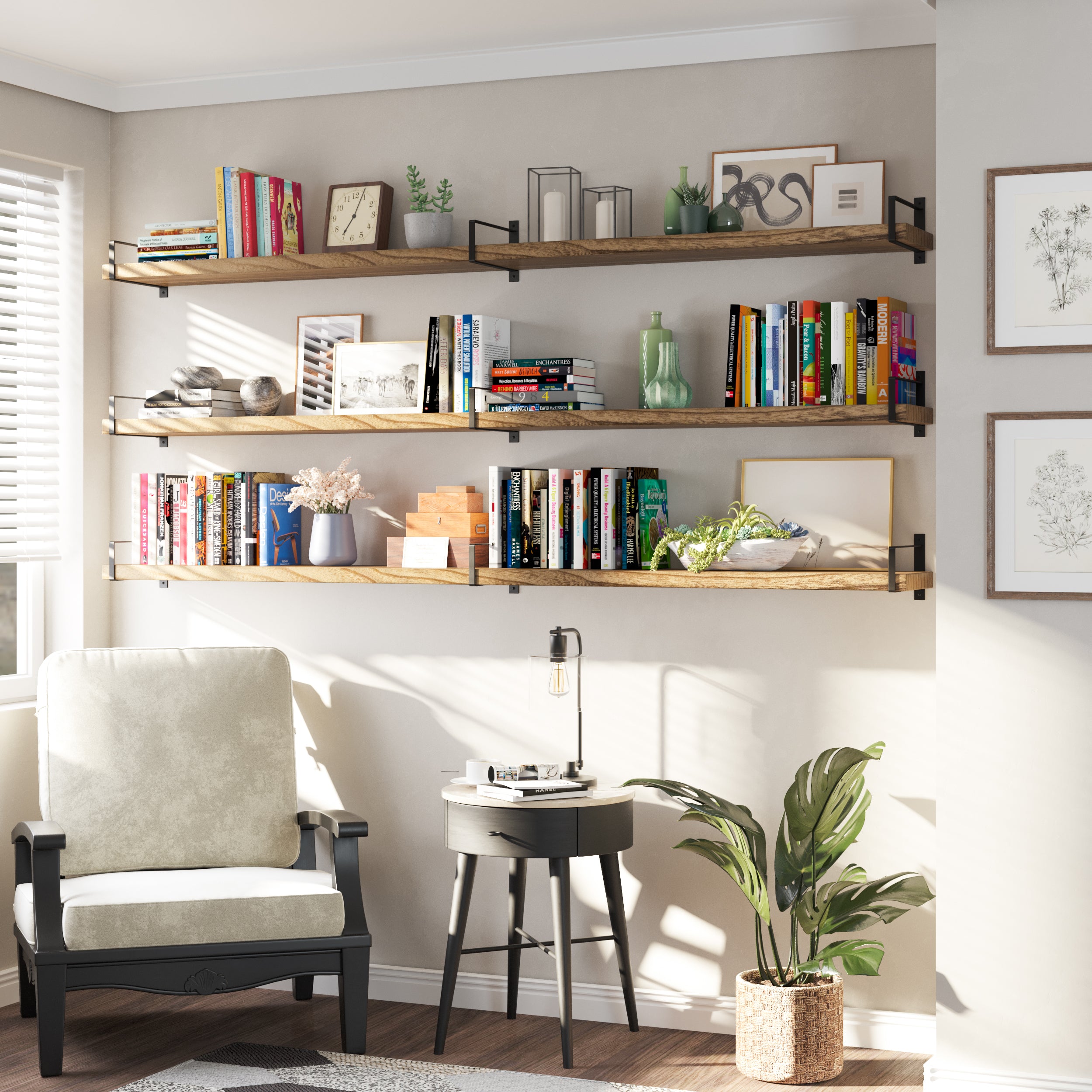 Three floating bookshelve for living room decor with side brackets mounted above a lounge chair. Each shelf is filled with colorful books, ceramics, candles, and framed art, offering stylish vertical storage in a cozy reading nook.