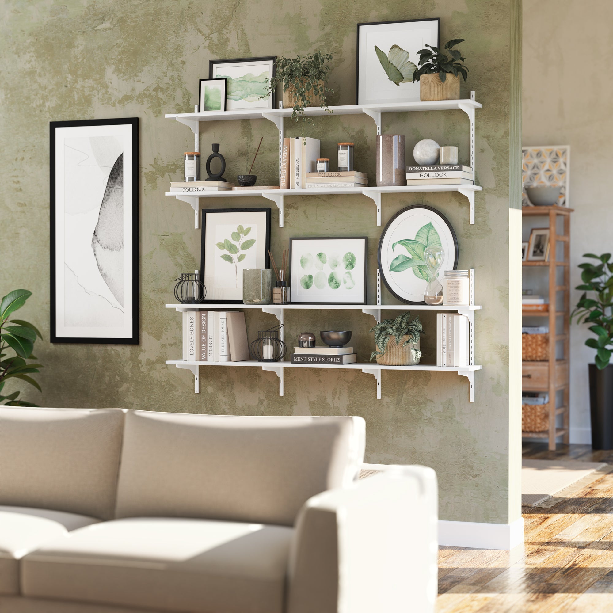 Decorative items and books on 60'' white display shelves, with a green wall enhancing the charm.