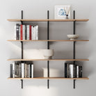 4 tiered hanging shelves with books and decorative items against a gray wall