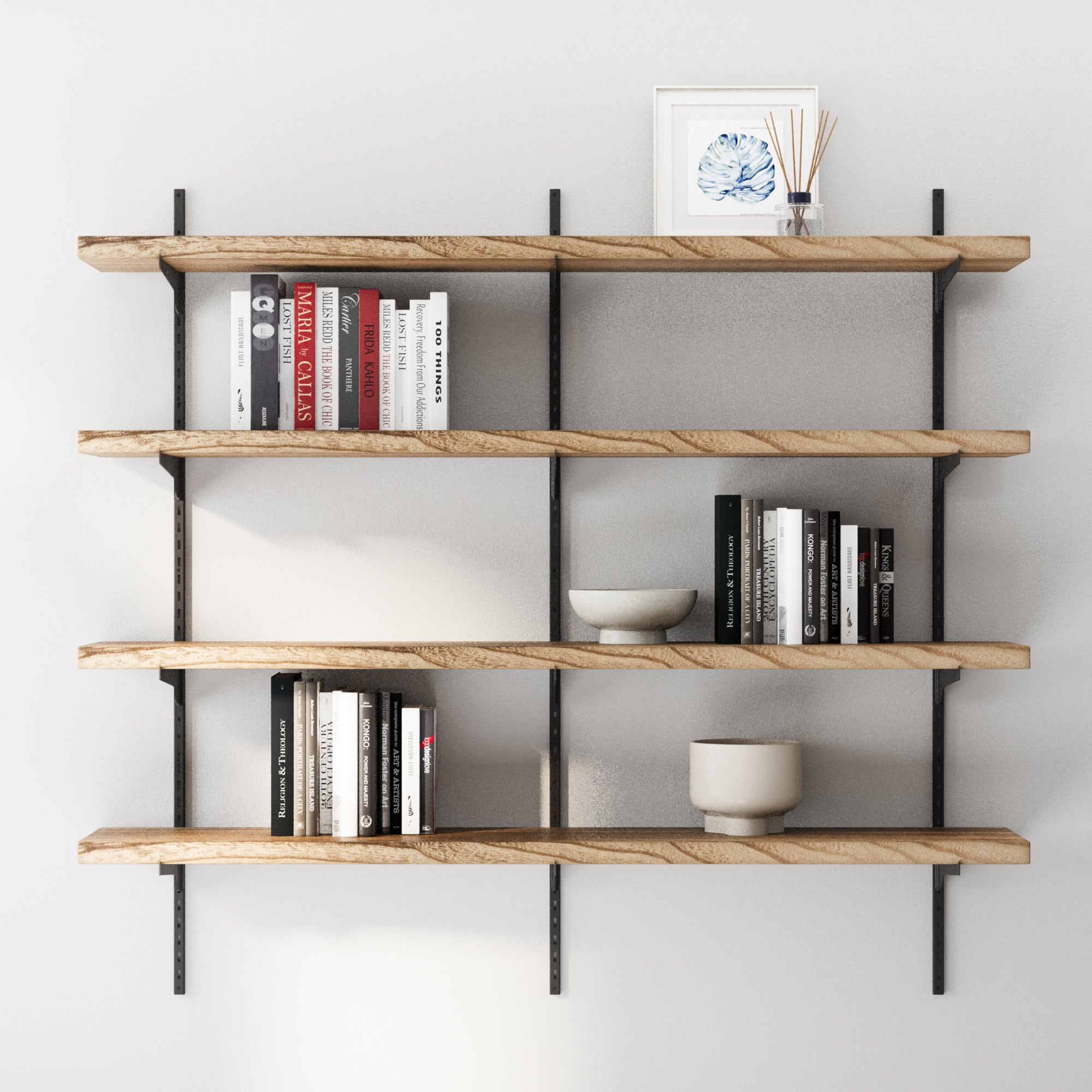 4 tier wall mounted decorative shelf with books and decor items against a white wall