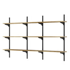 Set of four wooden shelves with black metal brackets on a white background