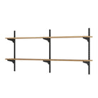Wooden shelves with black metal brackets on a white background