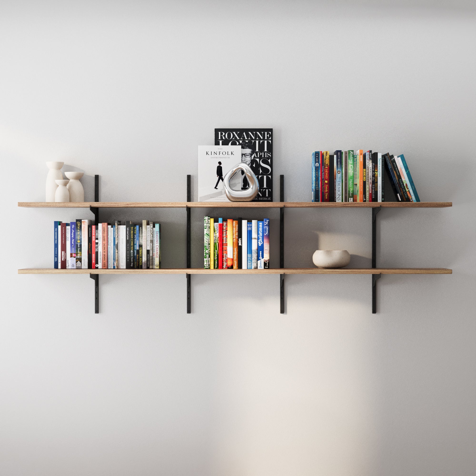 72 inch long wooden boho shelves with books and decorative items against a white wall