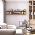 Modern living room with a sofa, coffee table, and 2 tier farmhouse bookshelves for living room decor.