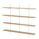 Set of four wooden shelves with white brackets on a white background