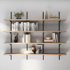 4 tiered adjustable shelving unit with books, plants, and decorative items against a gray wall.