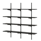A 4 tier black shelving unit with black metal rails, black brackets, and black wood boards, highlighting its clean, adjustable structure.