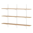 Three tier rustic shelving unit with heavy duty metal brackets and rails in white color.